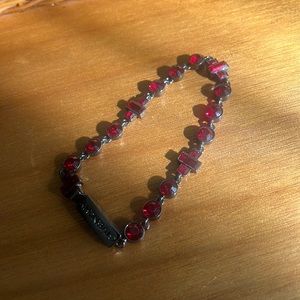 Givenchy ~Red glistening stone bracelet on gunmetal